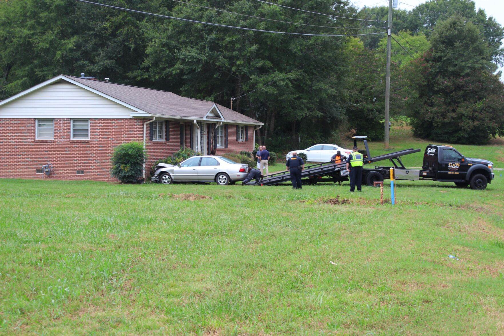 Car totaled in Wayside Drive house crash